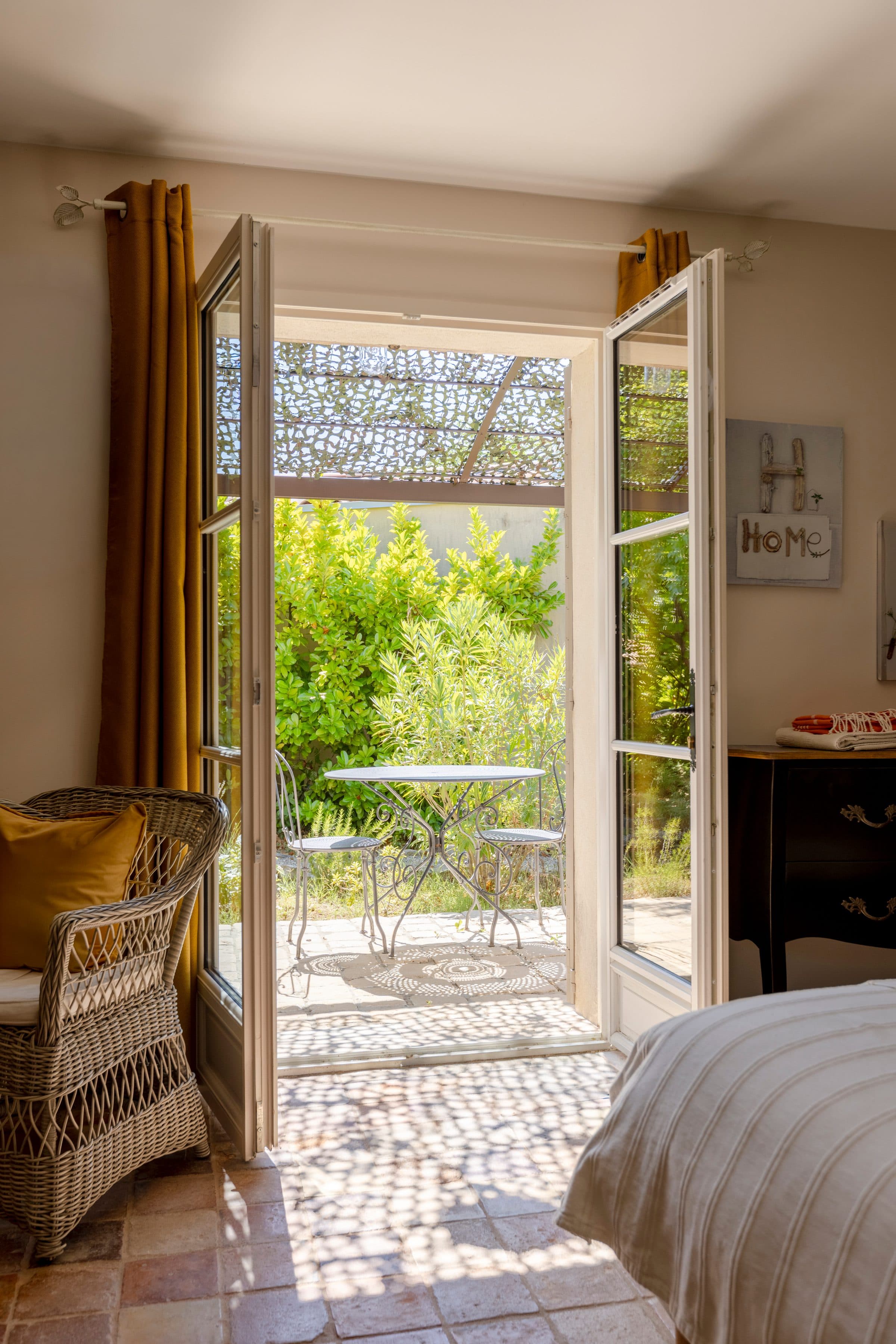 The French window open onto the private terrace