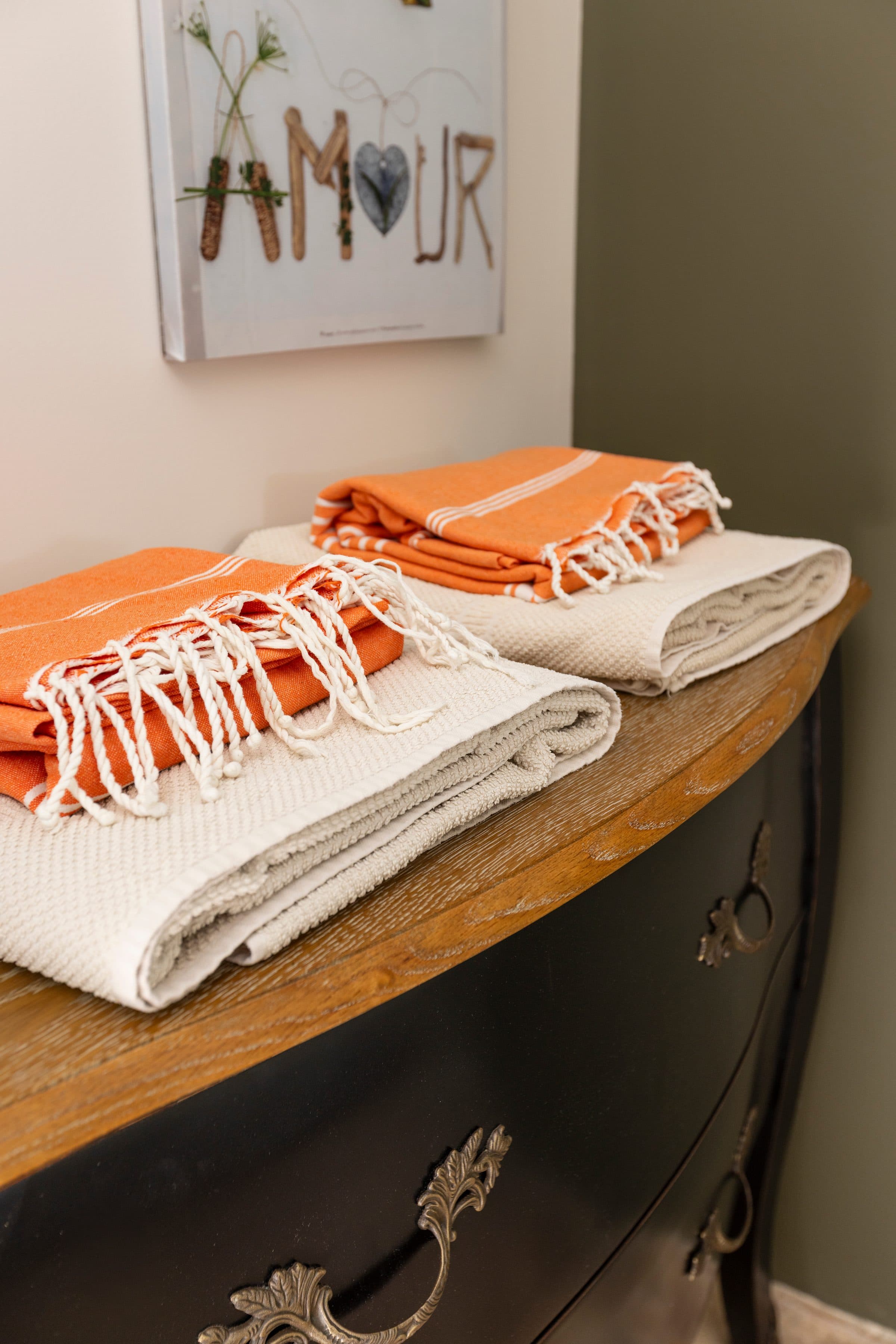 Household linen on the chest of drawers