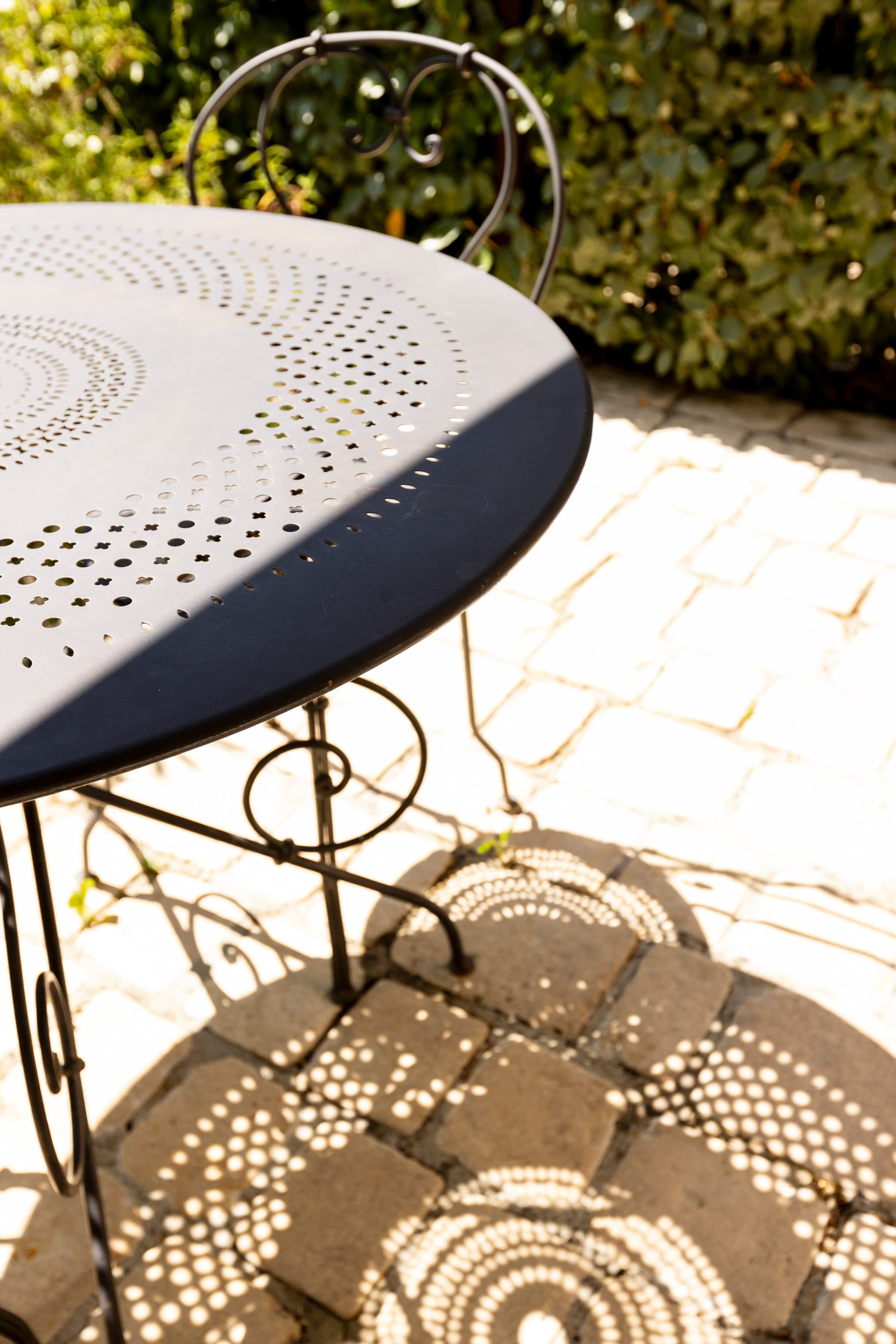 The wrought-iron table on the terrace